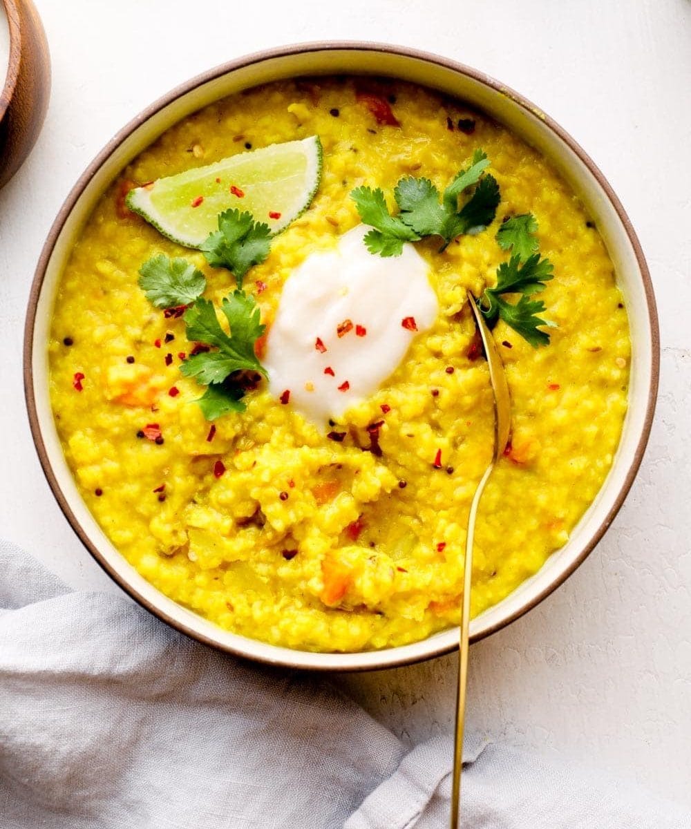 A bowl of kitchari with turmeric and ginger.