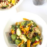 This nutrient dense salad is packed with caramelized squash, brussel sprouts, beans, and dried apricots! #glutenfree #vegan
