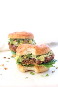 A thick juicy black bean patty topped with guacamole, corn salsa, and sprouts.