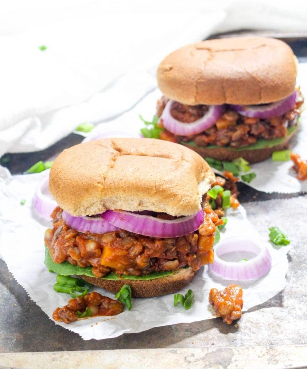 This Pumpkin Sloppy Joes recipe has a killer homemade sauce that is sweet, tangy, and perfectly tomato-y. They are an easy, gluten free, and vegan weeknight dinner. The addition of pumpkin makes them perfect for fall! | Catching Seeds