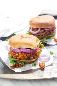 This Pumpkin Sloppy Joes recipe has a killer homemade sauce that is sweet, tangy, and perfectly tomato-y. They are an easy, gluten free, and vegan weeknight dinner. The addition of pumpkin makes them perfect for fall! | Catching Seeds
