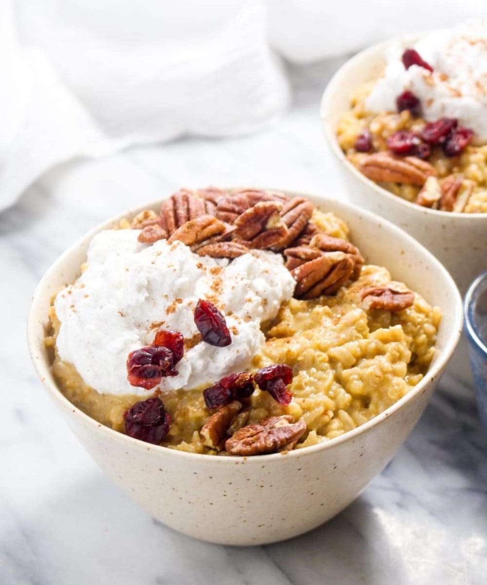 This is like eating Pumpkin Pie meets Rice Pudding for breakfast! And it is secretly healthy! This vegan and gluten free recipe is flavored with pumpkin and pumpkin pie spice. | CatcingSeeds.com