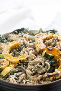This healthy 9 ingredient Soba Noodle Salad recipe is coated in a creamy and nutty tahini dressing and studded with caramelized winter squash and fresh kale. This gluten-free and vegan meal is equally perfect for lunch or dinner. | CatchingSeeds.com