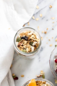 This Winter Fruit Muesli recipe is an easy to make breakfast that is packed with whole grains, healthy fats, and fruit to get you through the morning! This make ahead breakfast recipe is vegan and gluten free. | CatchingSeeds.com