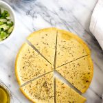 This Easy Homemade Socca Recipe is a tasty and delicious flatbread! It can be made in jut a few minutes and makes a great vegan and gluten free side for soups and salads! | CatchingSeeds.com