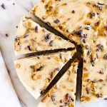 Vegan Cookie Dough Cheesecake is a two step recipe that yields a healthy(ish) dessert. Big chunks of gluten-free cookie dough and swirled through a sweet and tangy cheesecake filling. | CatchingSeeds.com