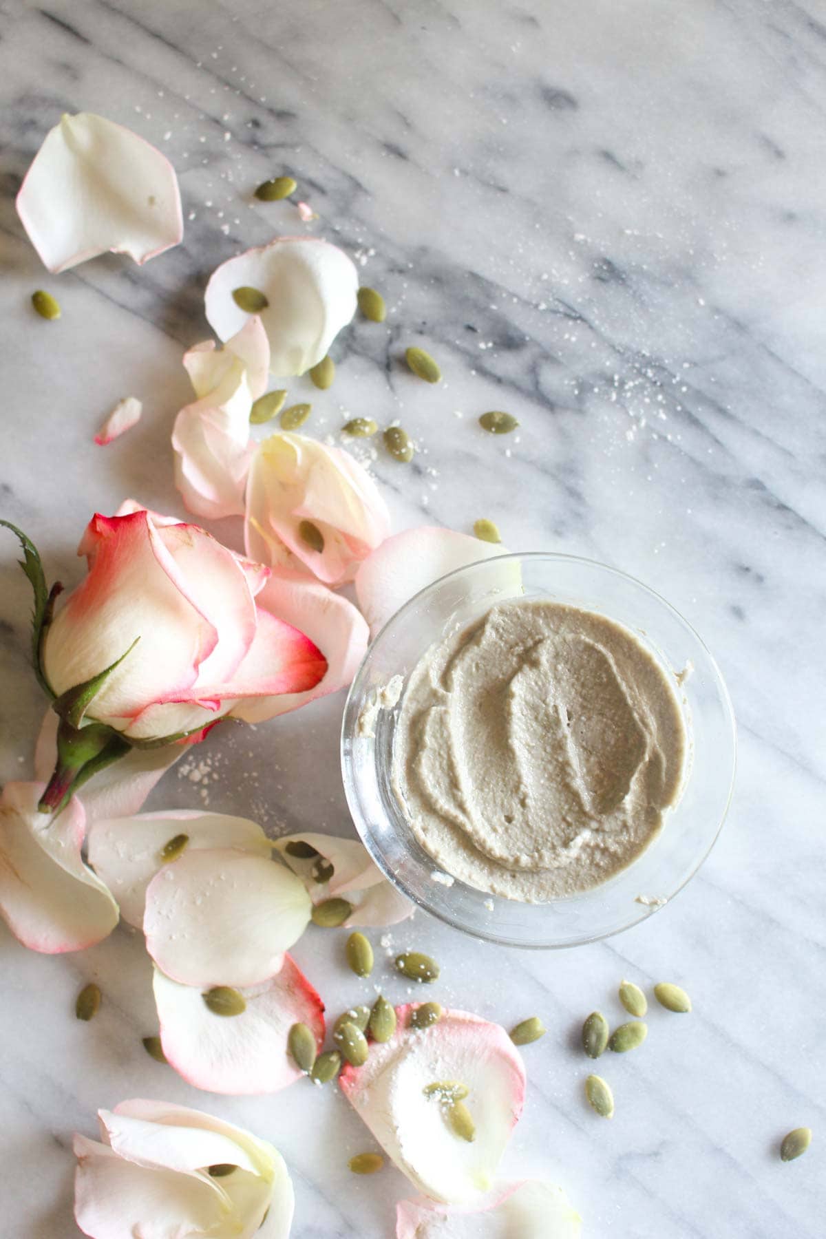 This Pumpkin Seed Rosewater Face Mask is a hydrating and detoxifying facial all-in-one! It will gently clean pores and banish blackheads while hydrating your skin. Great for all skin types - including sensitive. | CatchingSeeds.com