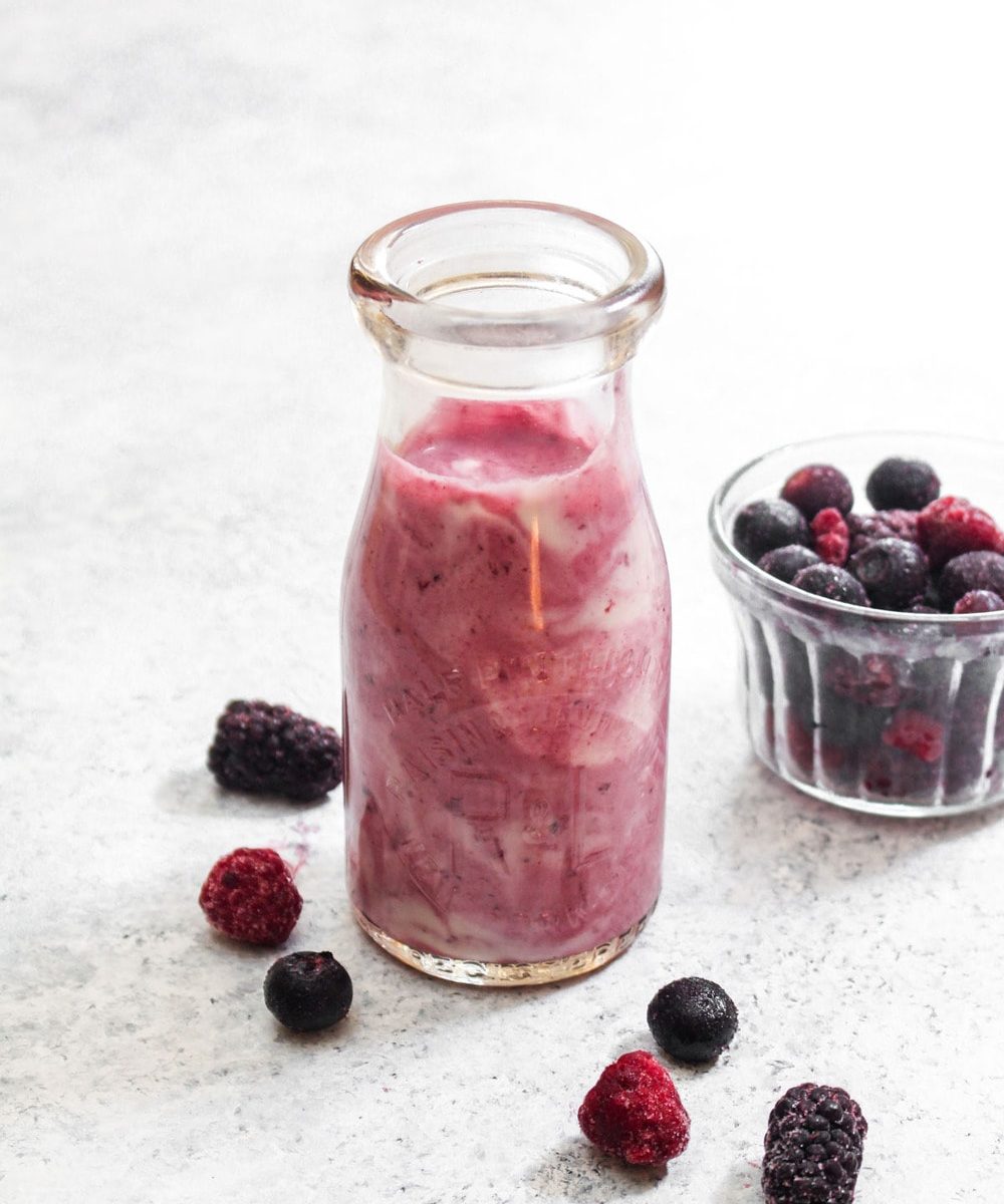 This 3 ingredient Drinkable Vegan Yogurt is a probiotic rich drink that is full of flavor! The sweet berries combined with the tangy coconut cashew yogurt is the perfect match. This simple method uses only a probiotic capsule and requires no fancy equipment. A creamy breakfast or snack that is paleo, vegan, gluten free, grain free, dairy free and sugar free. Made with just cashews, coconut, probiotics and berries. | CatchingSeeds.com