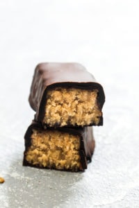 Healthy Salted Caramel Coconut Candy Bars are a party of sweet flavors that also happens to be paleo, gluten-free, and vegan! Healthy ingredients in this recipe combine to make a nutrient-packed dessert or snack. | CatchingSeeds.com