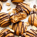These Peanut Butter Protein Cookies are a sweet treat that are secretly healthy! Fuel up with one of these vegan, gluten free, and even oil free cookies as your pre or post workout snack. With just 6 ingredients, you'll be making this easy recipe all the time. | CatchingSeeds.com
