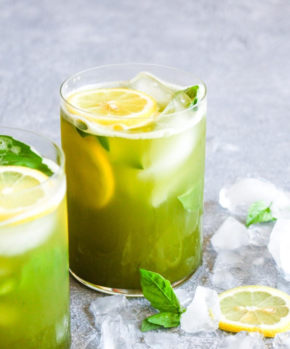 10 minute Matcha Basil Lemonade is a refreshing summer drink sweetened with honey! This healthy beverage is paleo and full of antioxidants. | CatchingSeeds.com