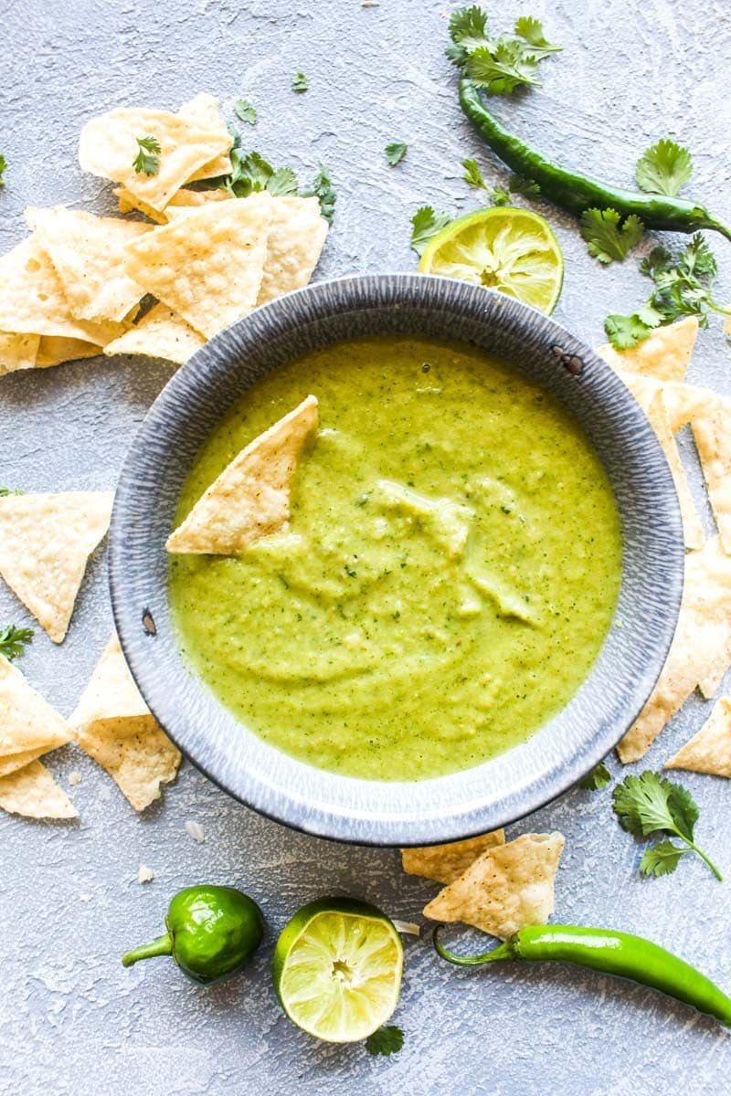 Cilantro Salsa Verde is surprisingly easy to make at home! This popular dip requires just 3 steps, and is packed with so much more flavor that the jarred stuff. | CatchingSeeds.com