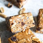 Peanut Butter Crunch Bars are a creamy, crispy, crunchy sweet treat that is healthy enough to enjoy as a snack! These gluten free bars are naturally sweetened and couldn't be easier to make. | CatchingSeeds