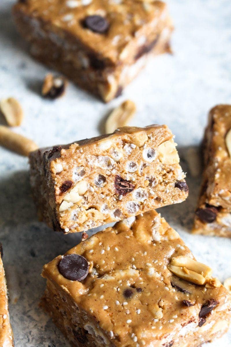 Peanut Butter Crunch Bars are a creamy, crispy, crunchy sweet treat that is healthy enough to enjoy as a snack! These gluten free bars are naturally sweetened and couldn't be easier to make. | CatchingSeeds