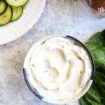 Garlic and Herb Vegan Cream Cheese with cucumbers and lettuce.