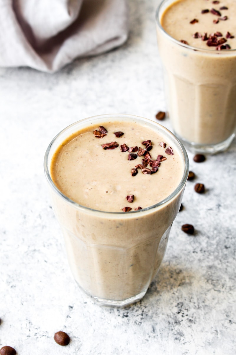 A healthy java chip smoothie topped with cacao nibs.