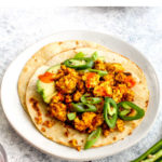 Easy high protein vegan tofu scramble breakfast tacos.