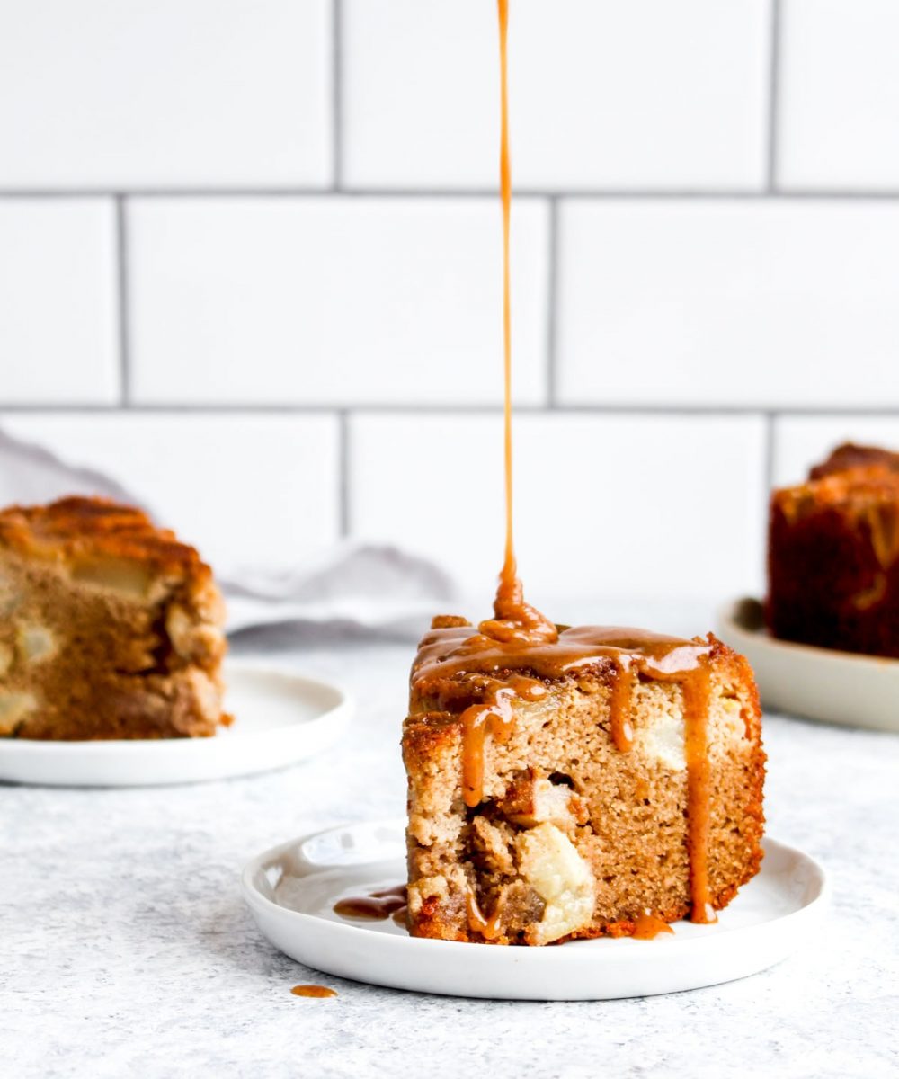 Caramel being drizzled on paleo pear cake.
