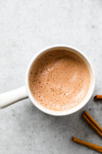 A mug of foamy healthy vegan hot chocolate.