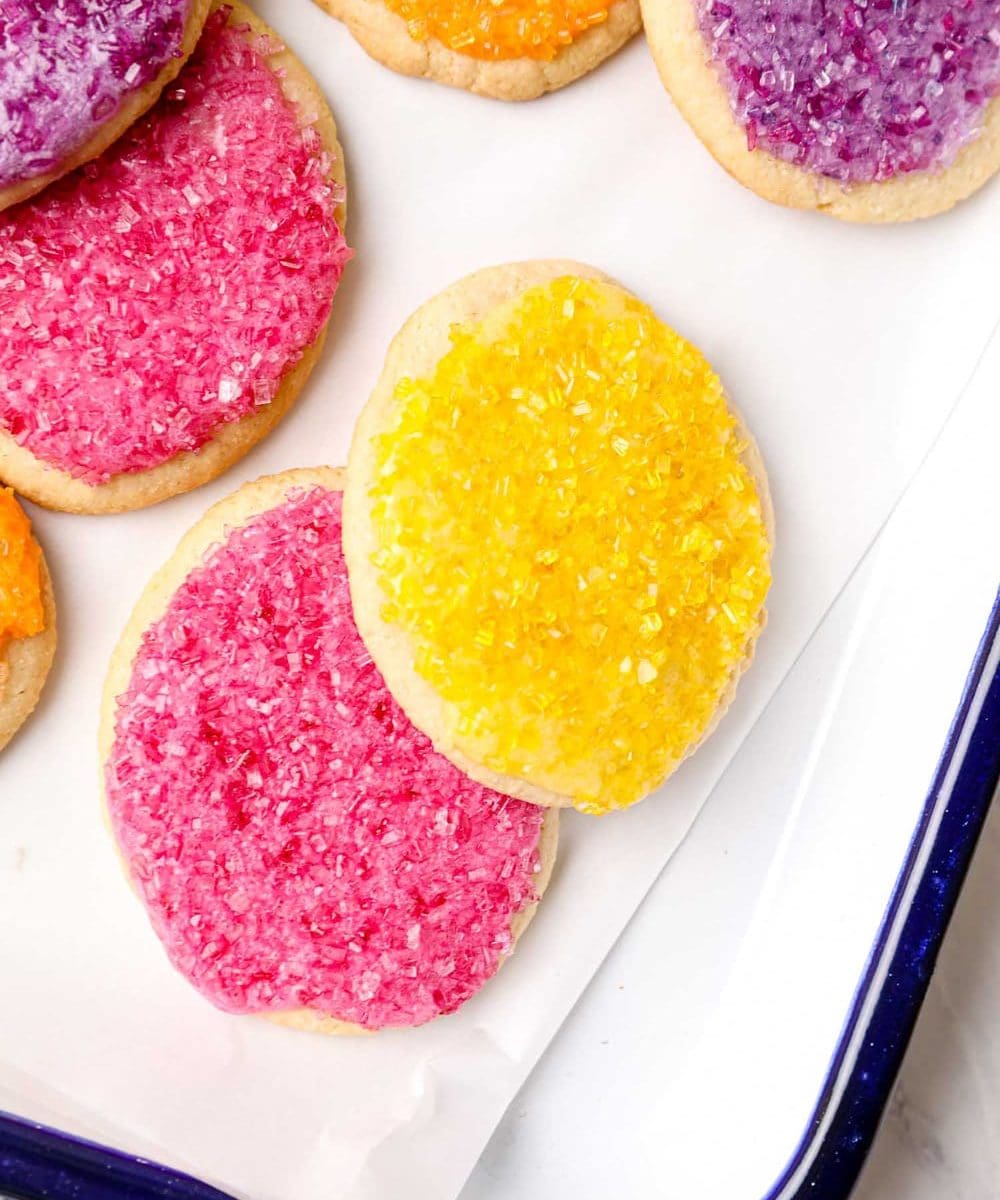 Grain free Easter egg sugar cookies with frosting and sprinkles.