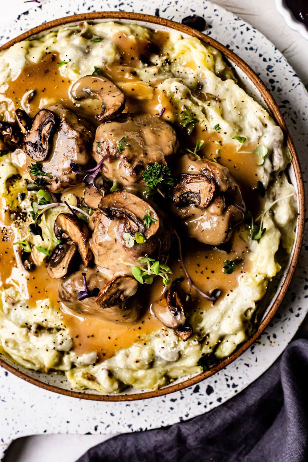 Vegan and gluten free Swedish meatballs with mashed potatoes.