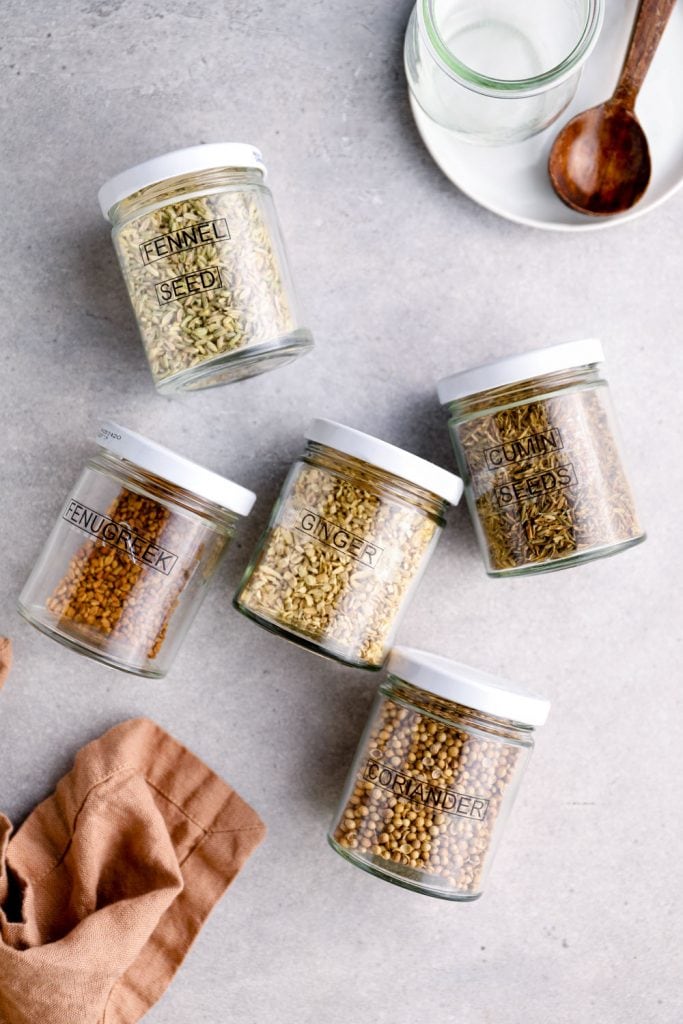 The whole spiced used to make tea for digestion - fennel seed, fenugreek, fried ginger pieces, cumin seeds, and coriander.
