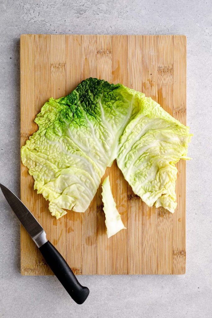The stem cut out of a softened cabbage leaf.
