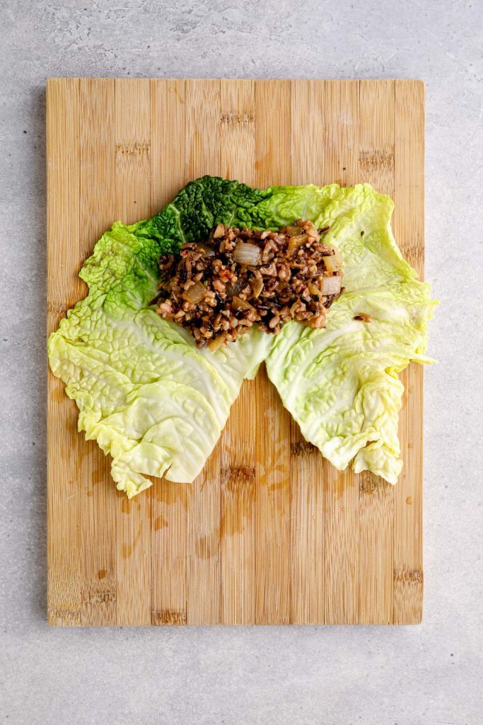 Wild rice and mushroom stuffing on a cabbage leaf.