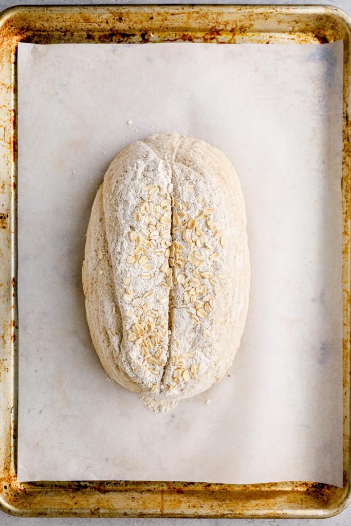 Unbaked bread on a sheet pan.