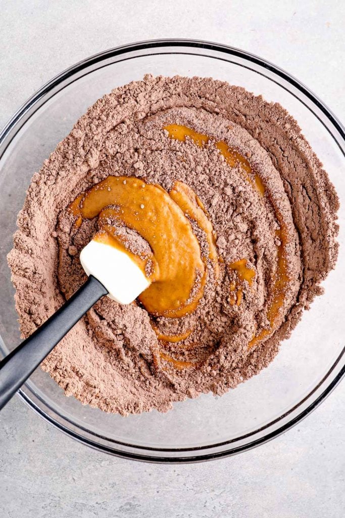 Wet and dry ingredients in a bowl.