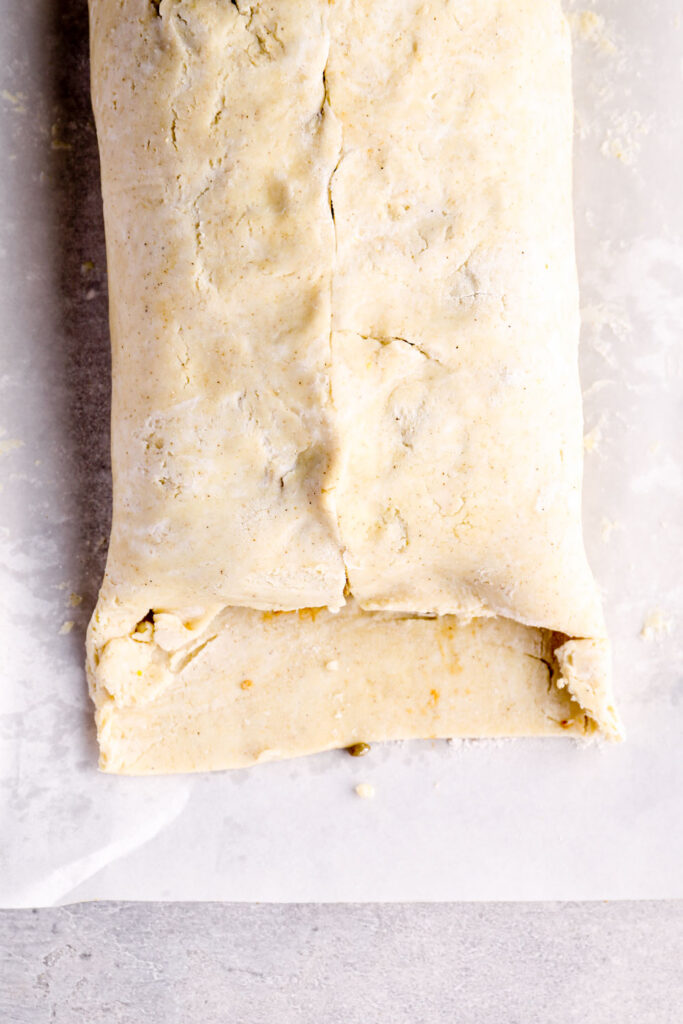 The overlap of the edge pieces of puff pastry cut out.