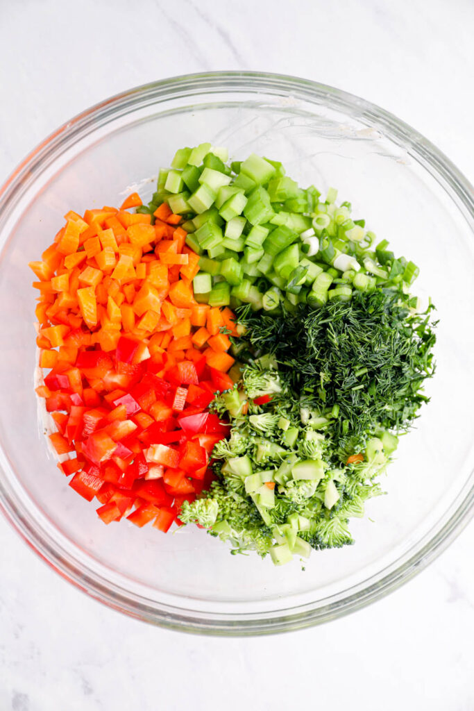 Chopped veggies in a glass bowl.